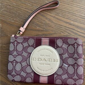 coach burgundy/cream/pink wristlet